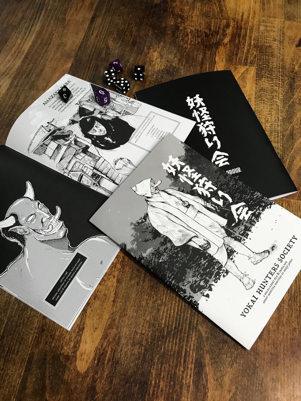 Yokai Hunters Society, a rules-light pen & paper RPG in zine format about Monster Hunting in Meiji Japan. Based on Tunnel Goons by Nate Treme