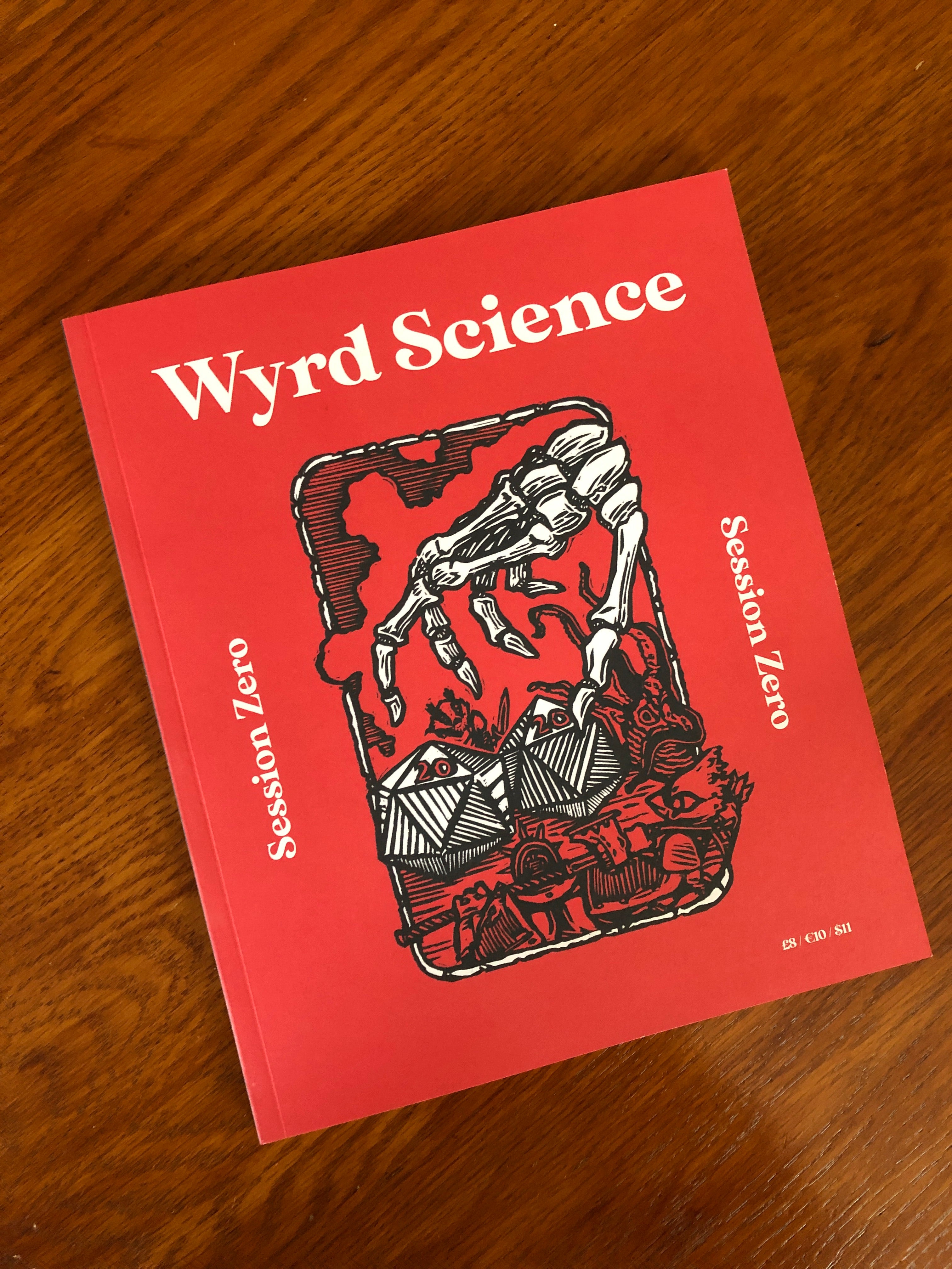Wyrd Science Session Zero Magazine - skeleton hand and d 20 dice